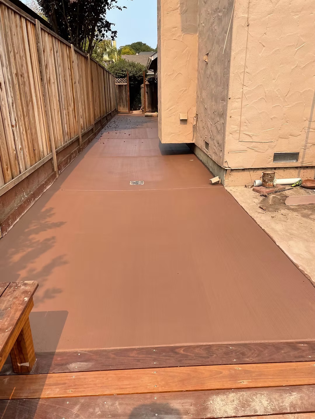Finished concrete walkway beside a Santa Cruz home